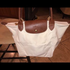 White small Longchamp purse
